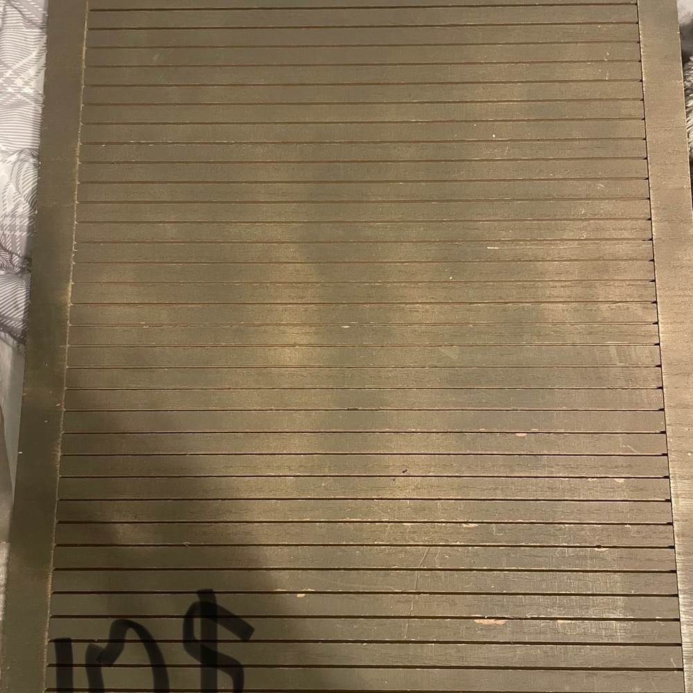 Wooden board with letters.